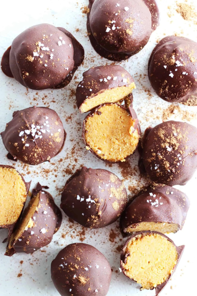 a batch of homemade vegan chocolate coated pumpkin truffles