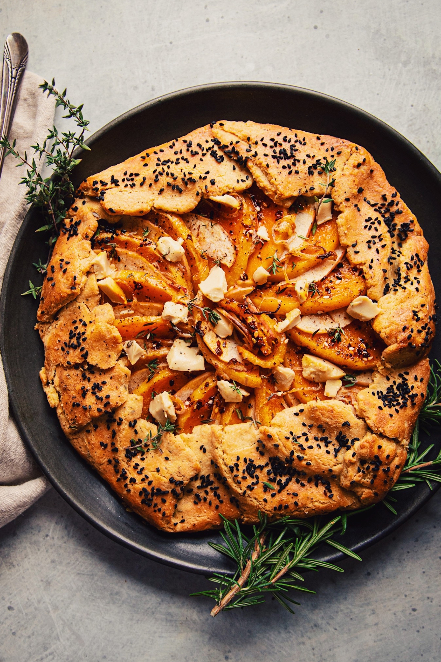 a squash galette with a black pepper pastry