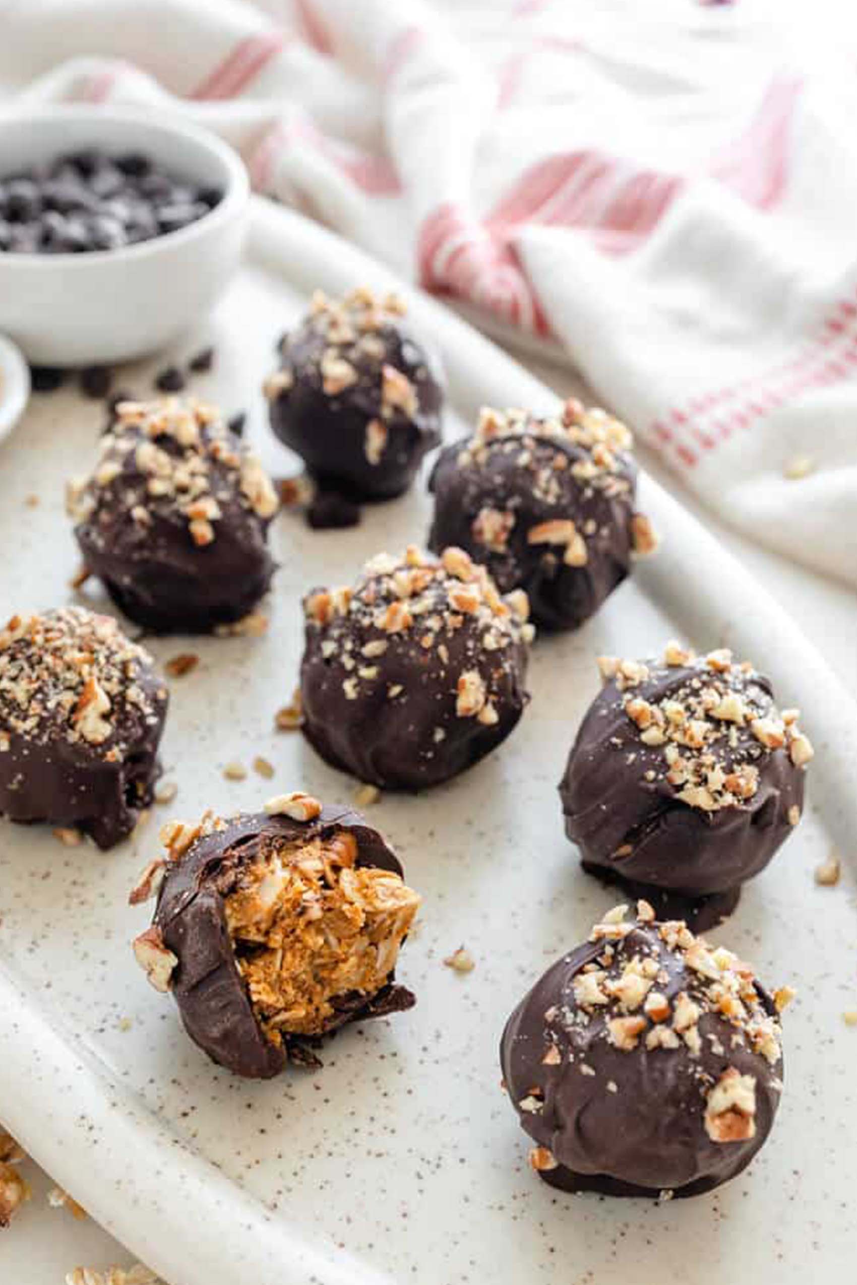 a batch of chocolate covered peanut butter balls