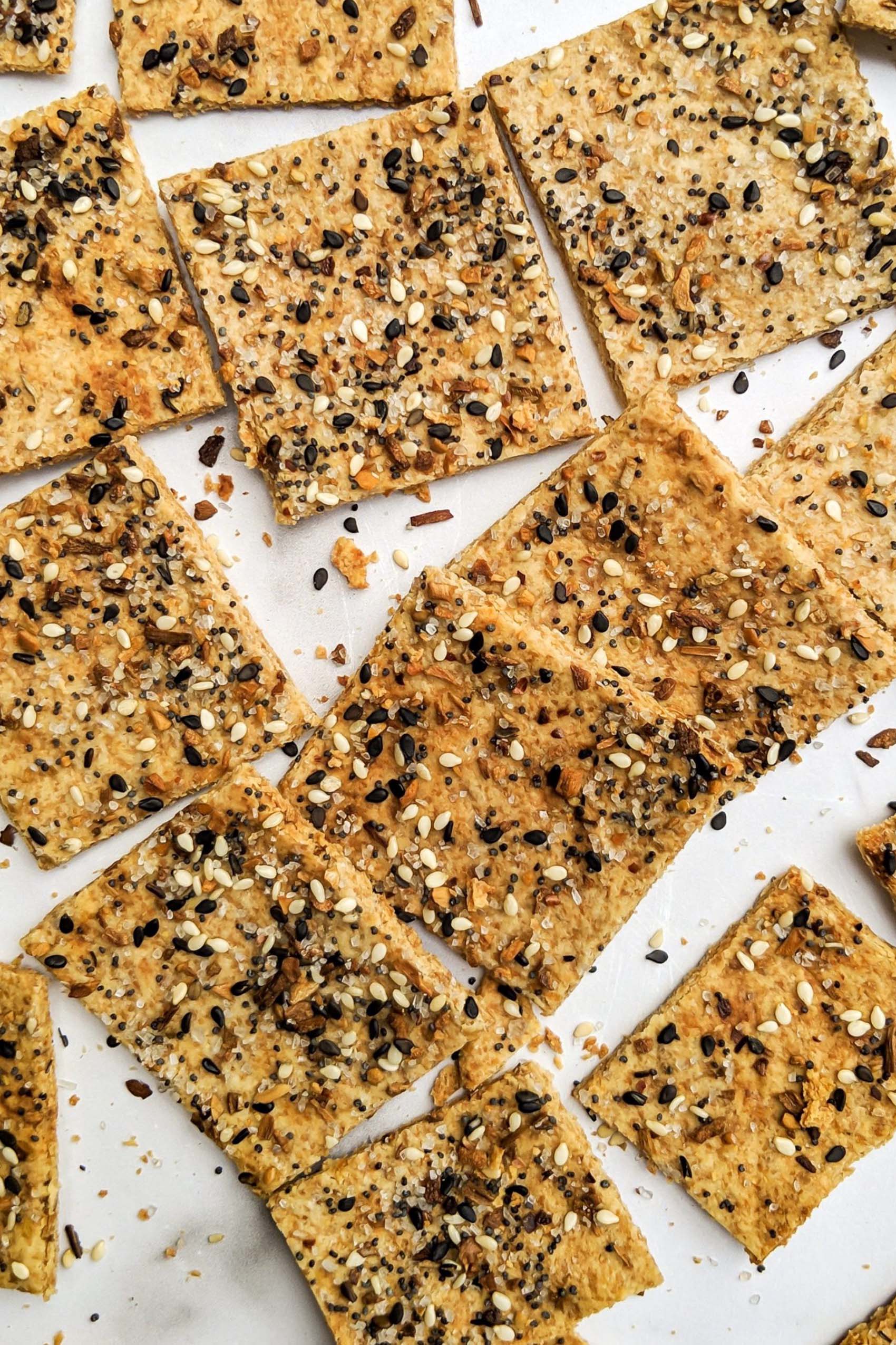 a batch of everything bagel seasoning seed crackers