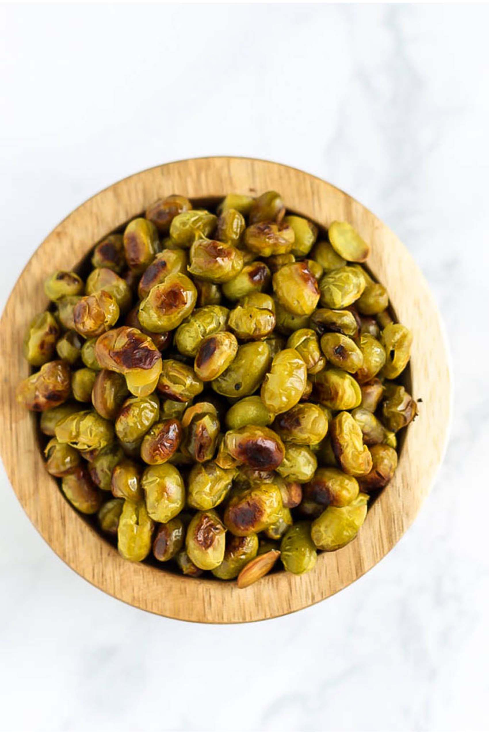 a bowl of salt and vinegar roasted edamame