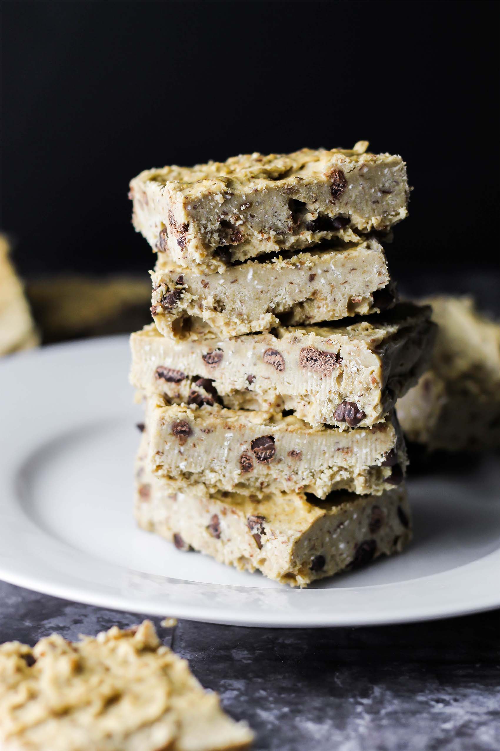 a stack of sliced chickpea chocolate chip cookie dough fudge