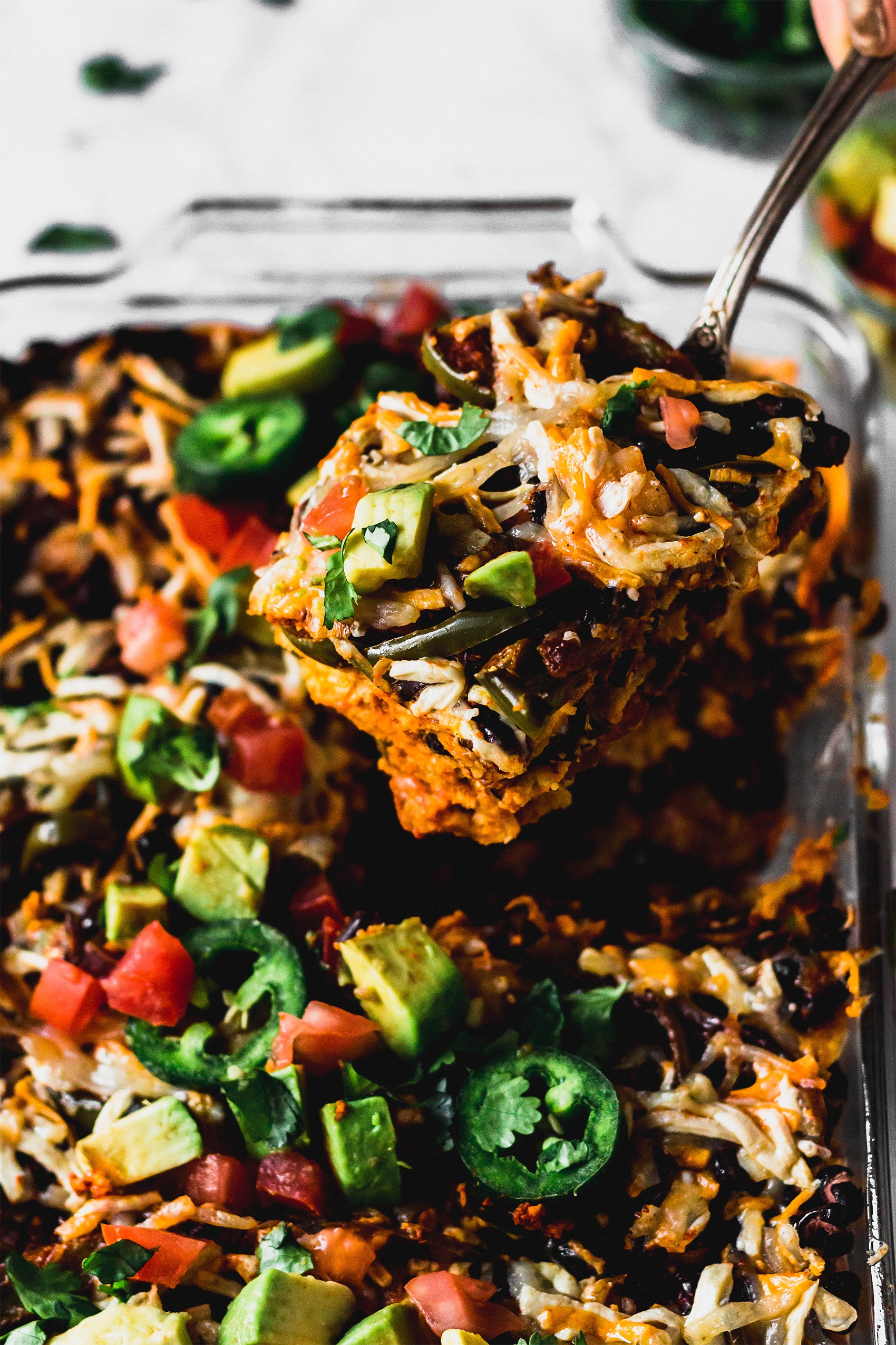 a dish of vegan enchilada casserole