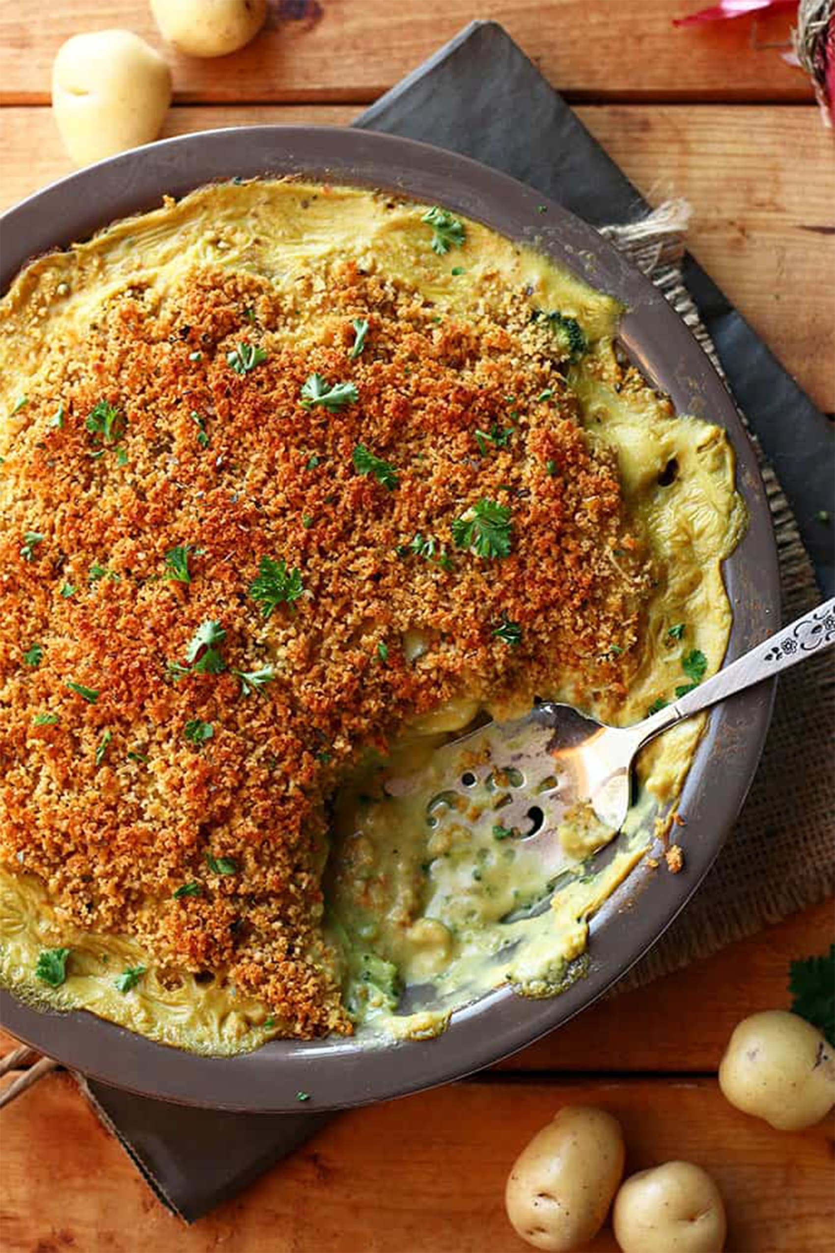a dish of cheesy vegan potato casserole