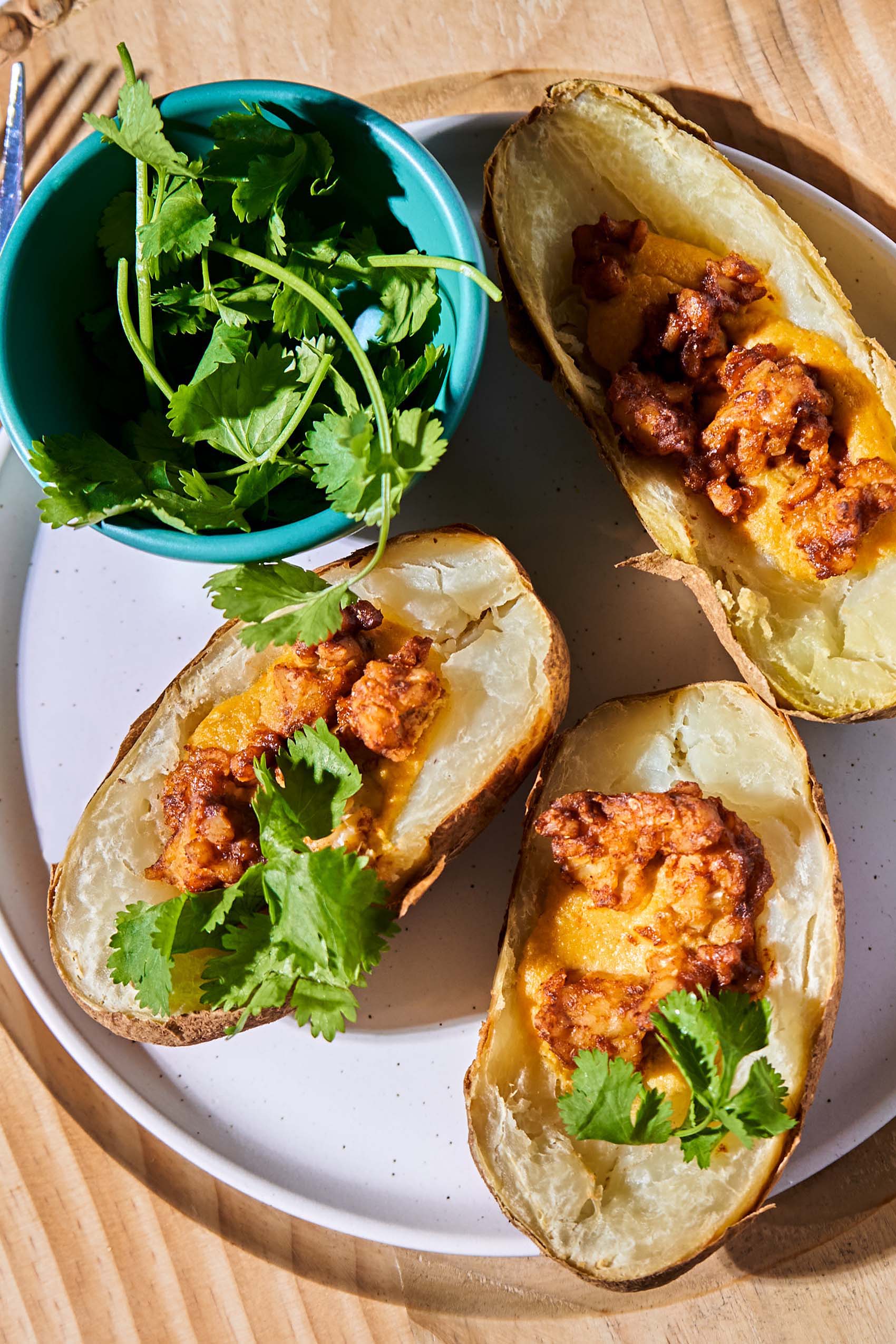 a plate of vegan loaded potato skins