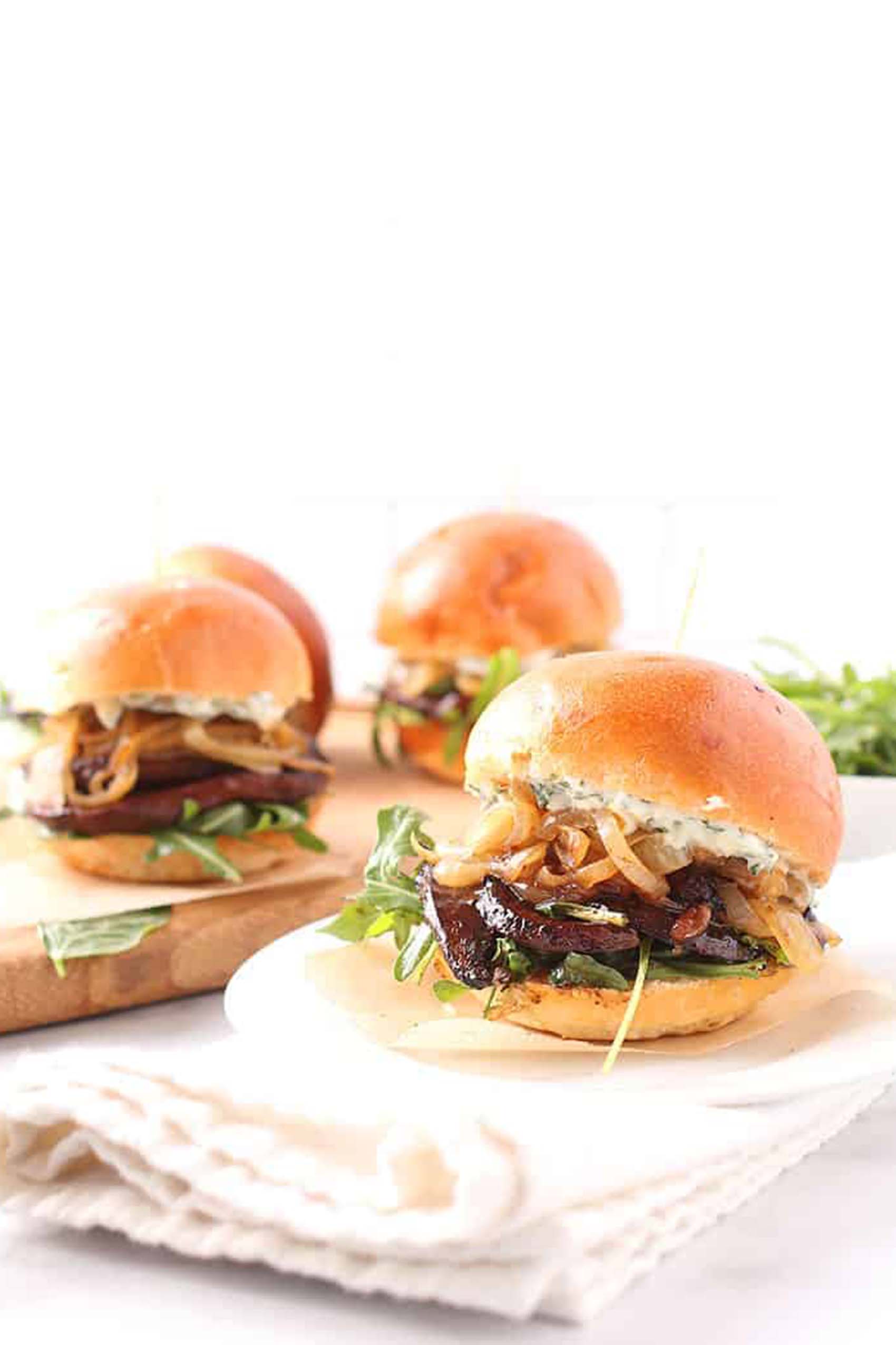 a tray of vegan portobello sliders