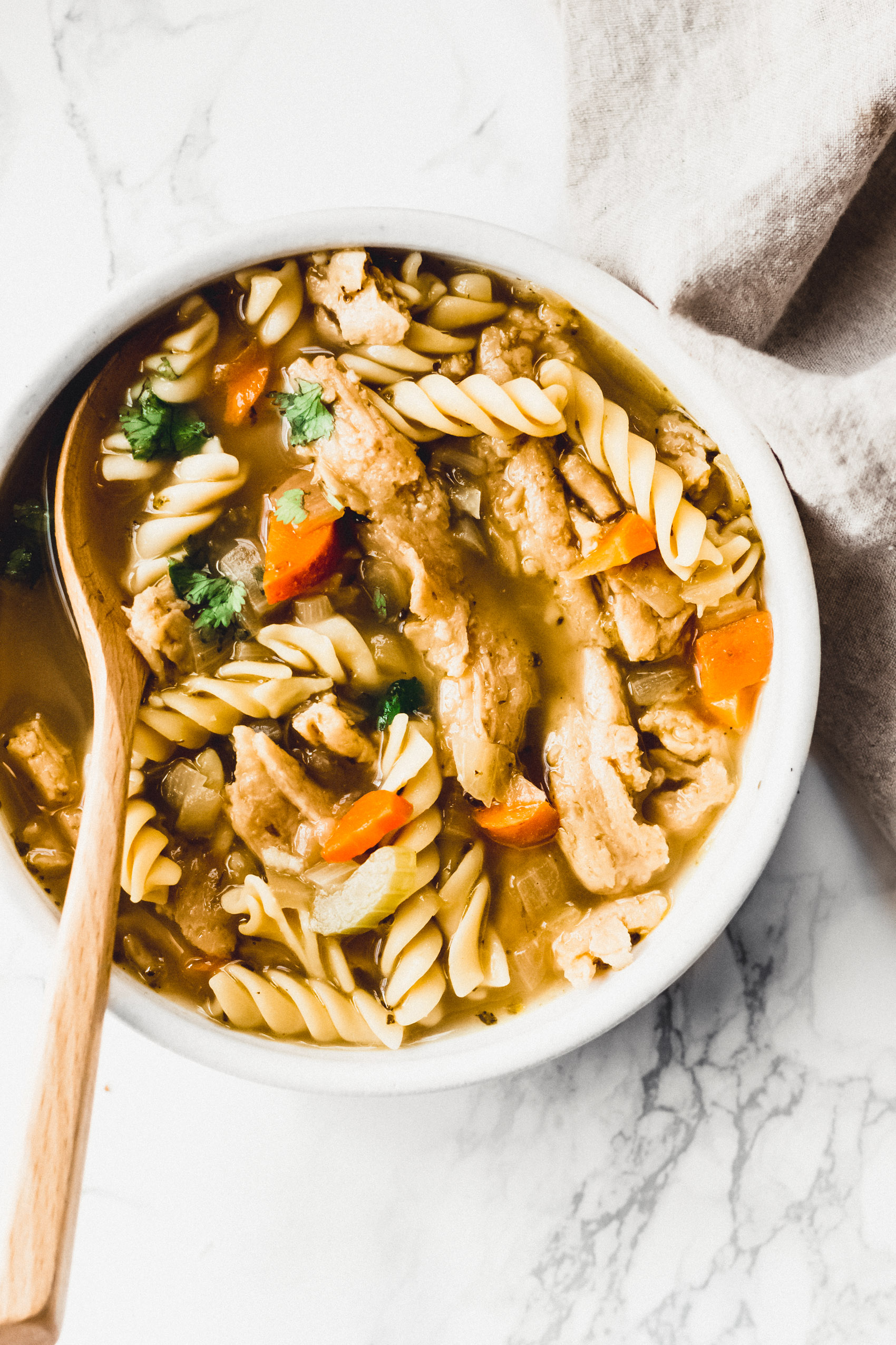 a bowl of homemade vegan chicken noodle soup