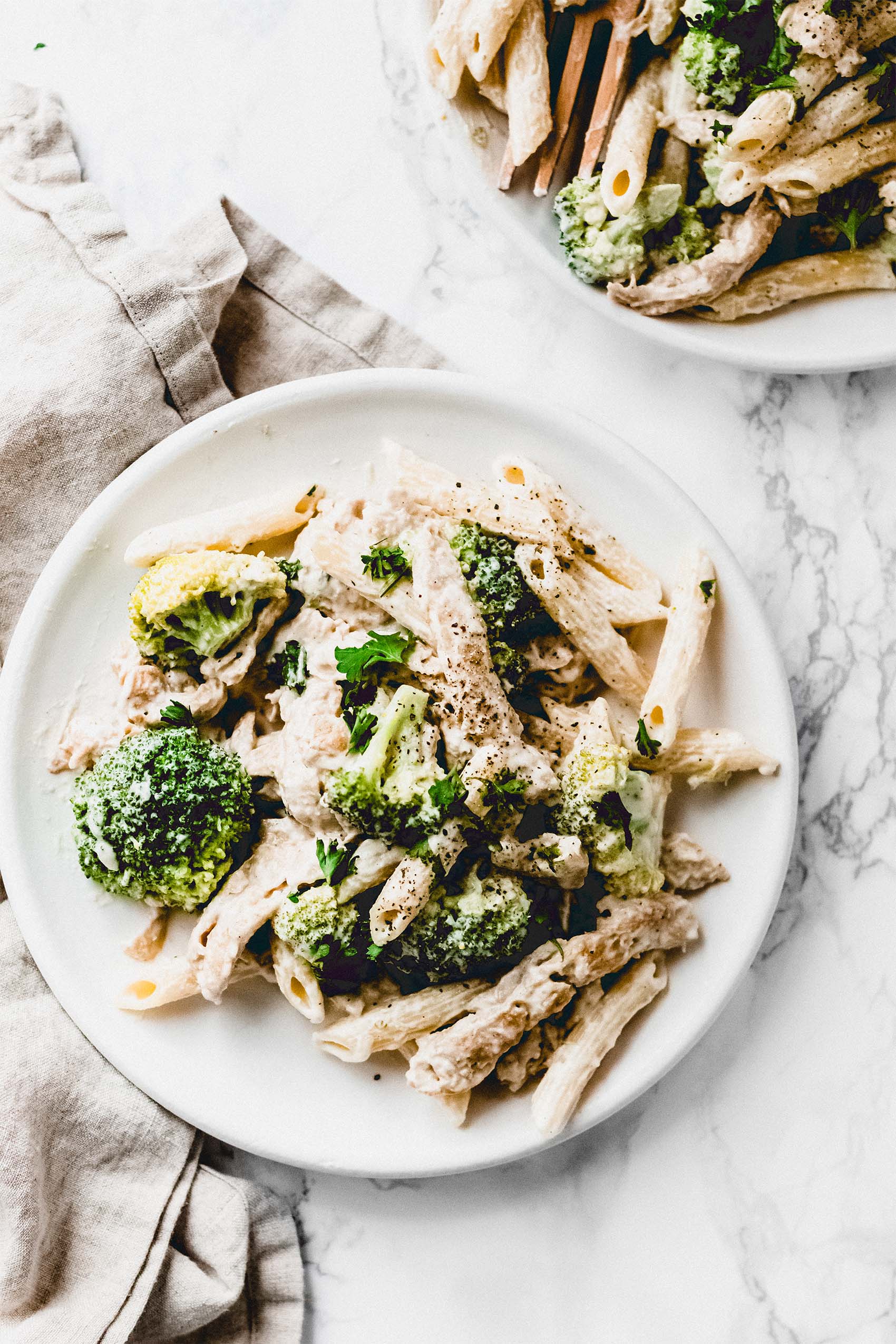 a plate of vegan chicken alfredo pasta