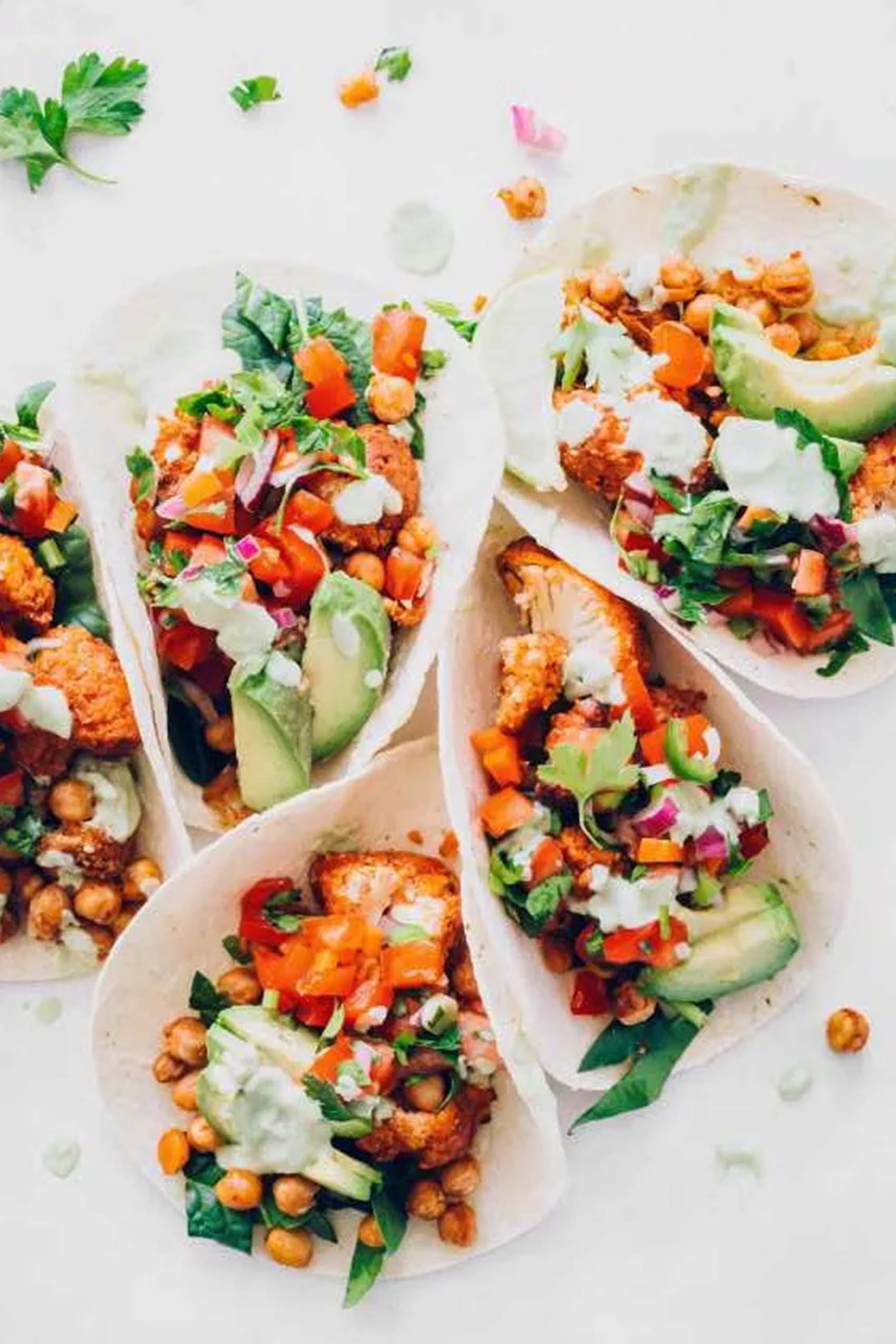 a plate of buffalo cauliflower tacos