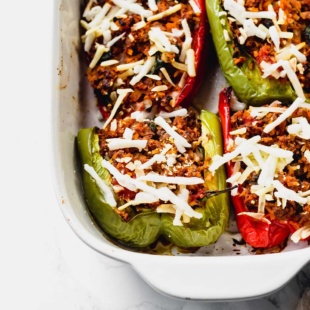 a dish of stuffed bell pepper halves