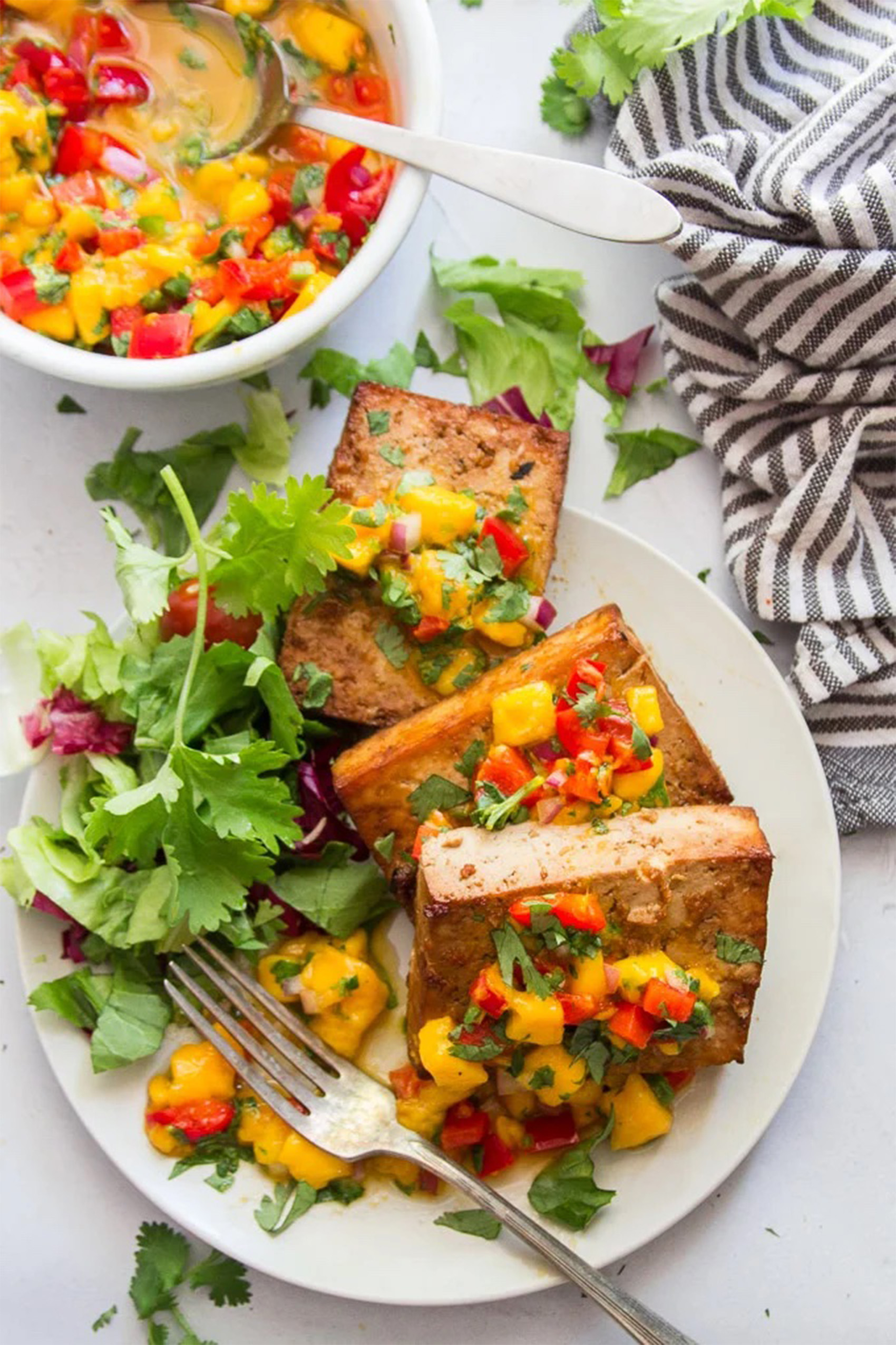 grilled tofu topped with mango salsa