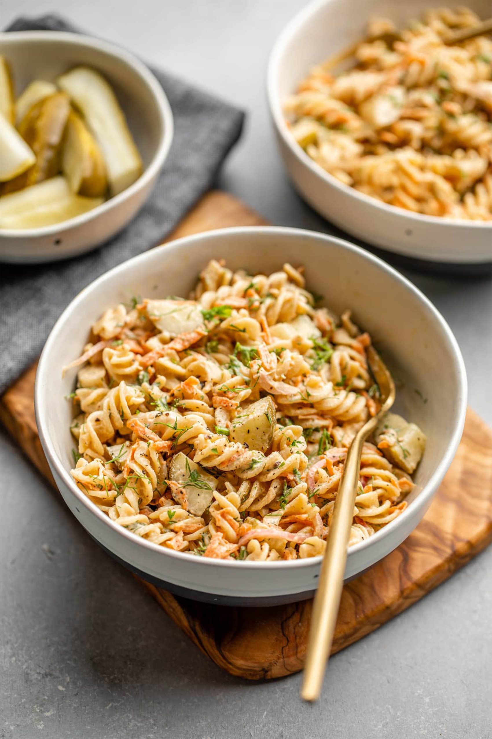 two bowls of dill pickle pasta salad