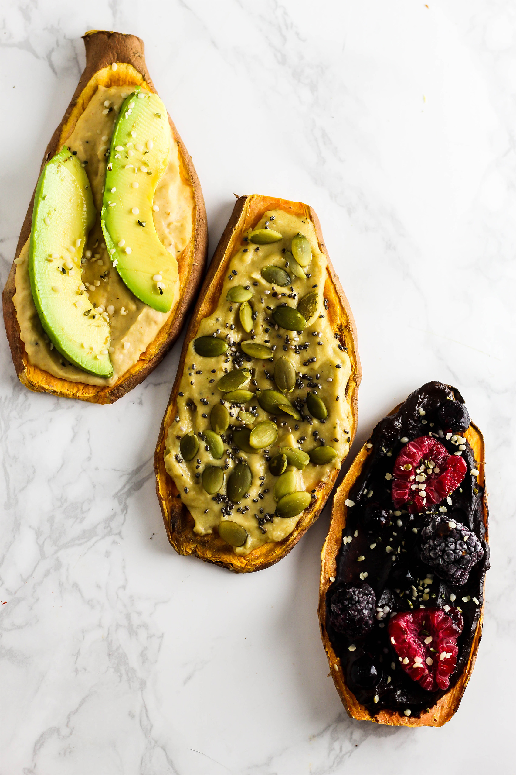 three thin slices of sweet potato each with different toppings