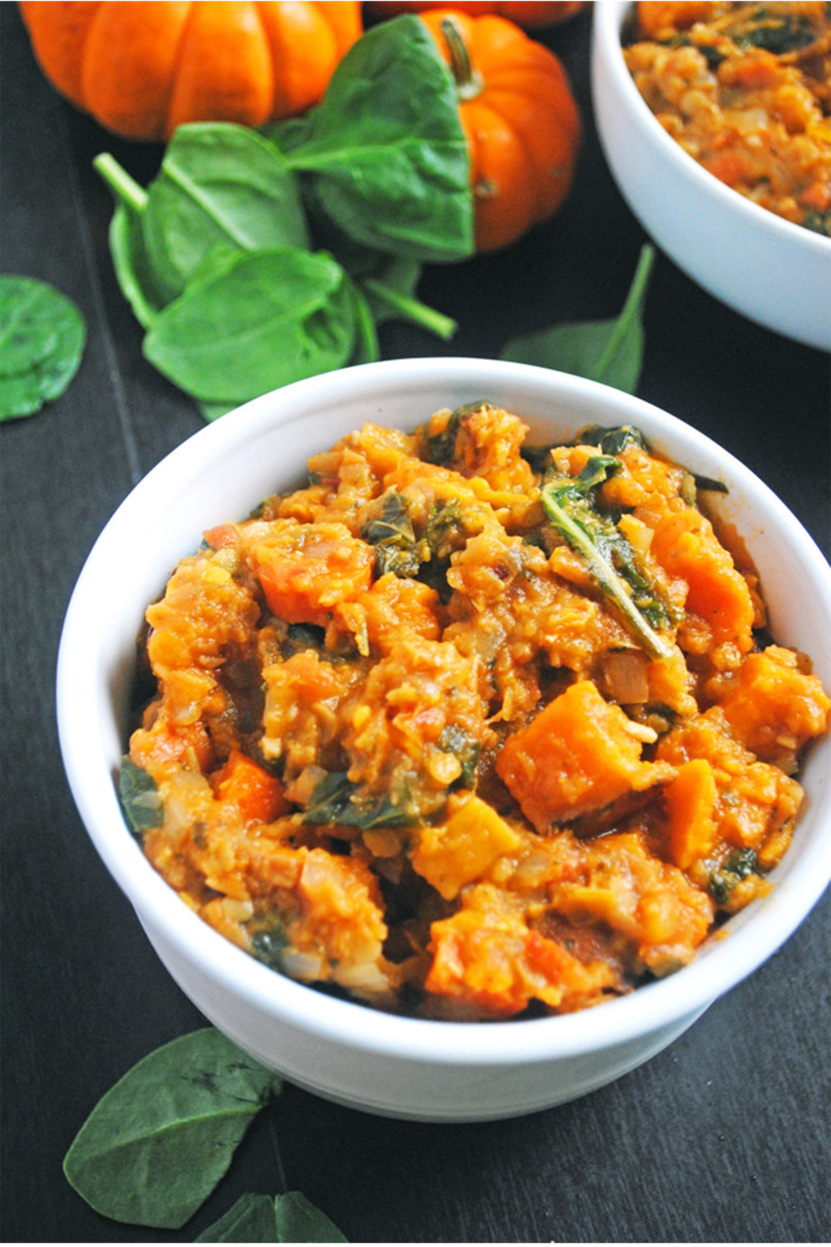 a bowl of red lentil sweet potato and carrot stew